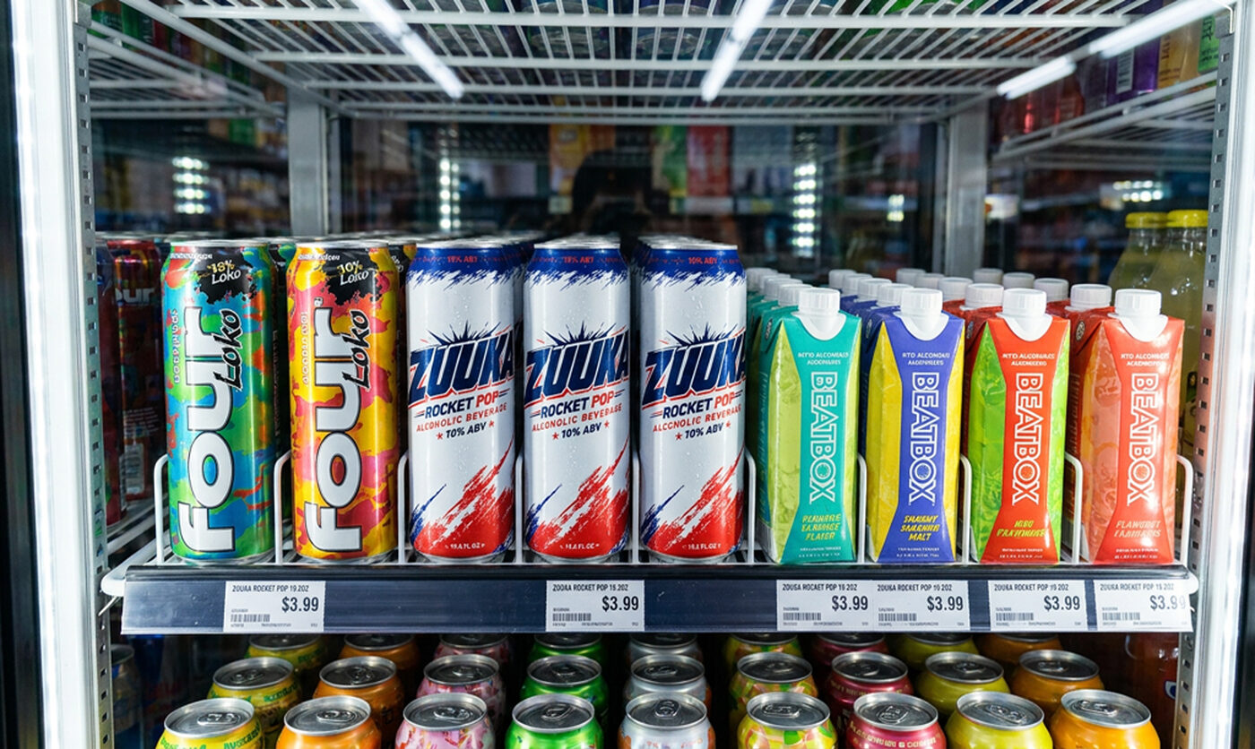 ZUUKA cans stocked in a retail cooler